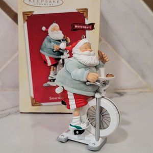 Hallmark Keepsake Christmas Ornament Santa Claus Snackercize peddles and eats